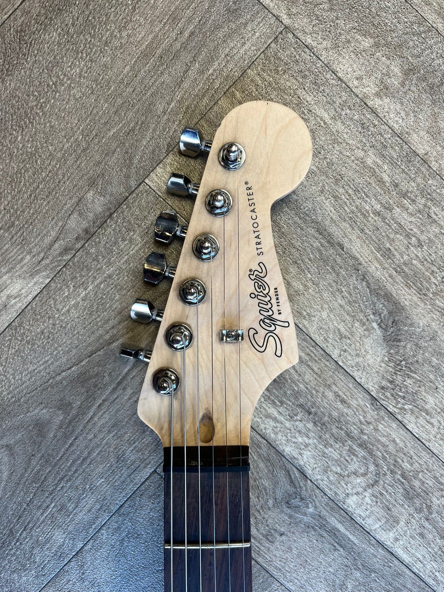 Modified Squier Stratocaster in Cherry Red with Black pickguard