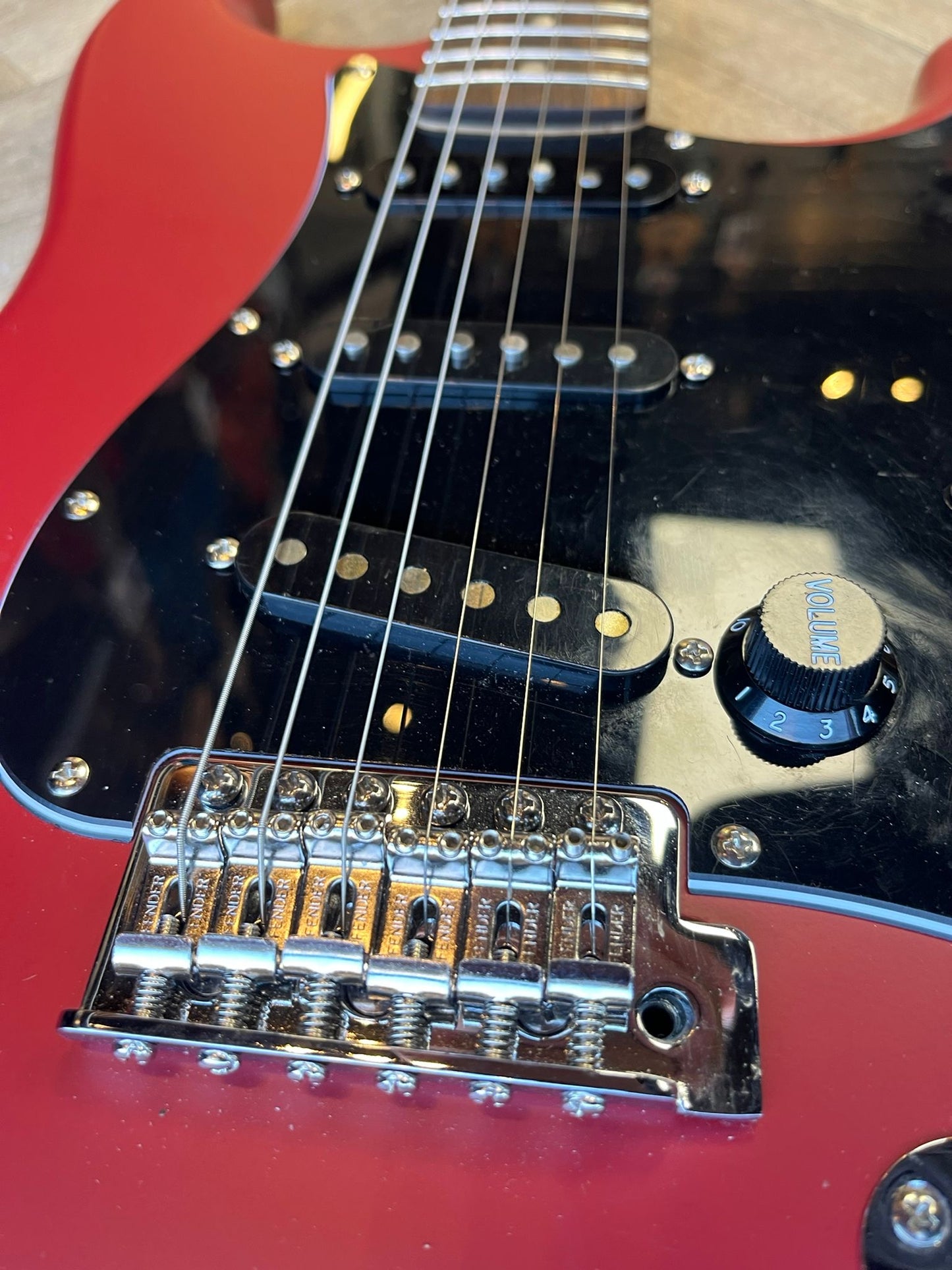 Modified Squier Stratocaster in Cherry Red with Black pickguard