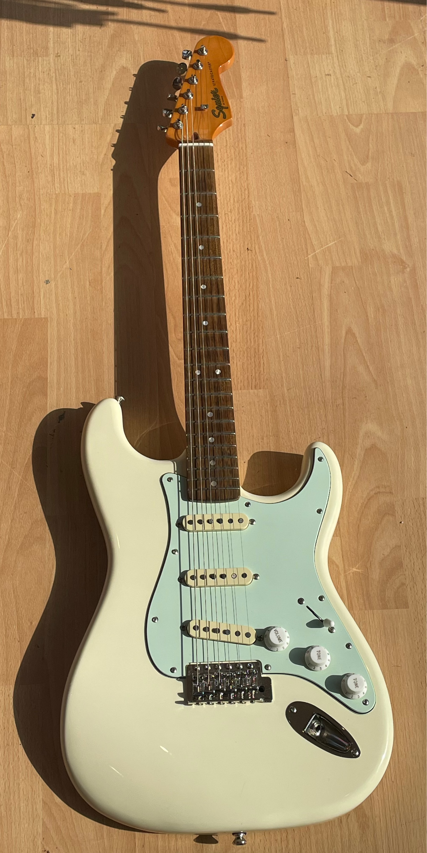 Squier Classic Vibe Strat with Beautiful Cream finish and Mint Green pickguard