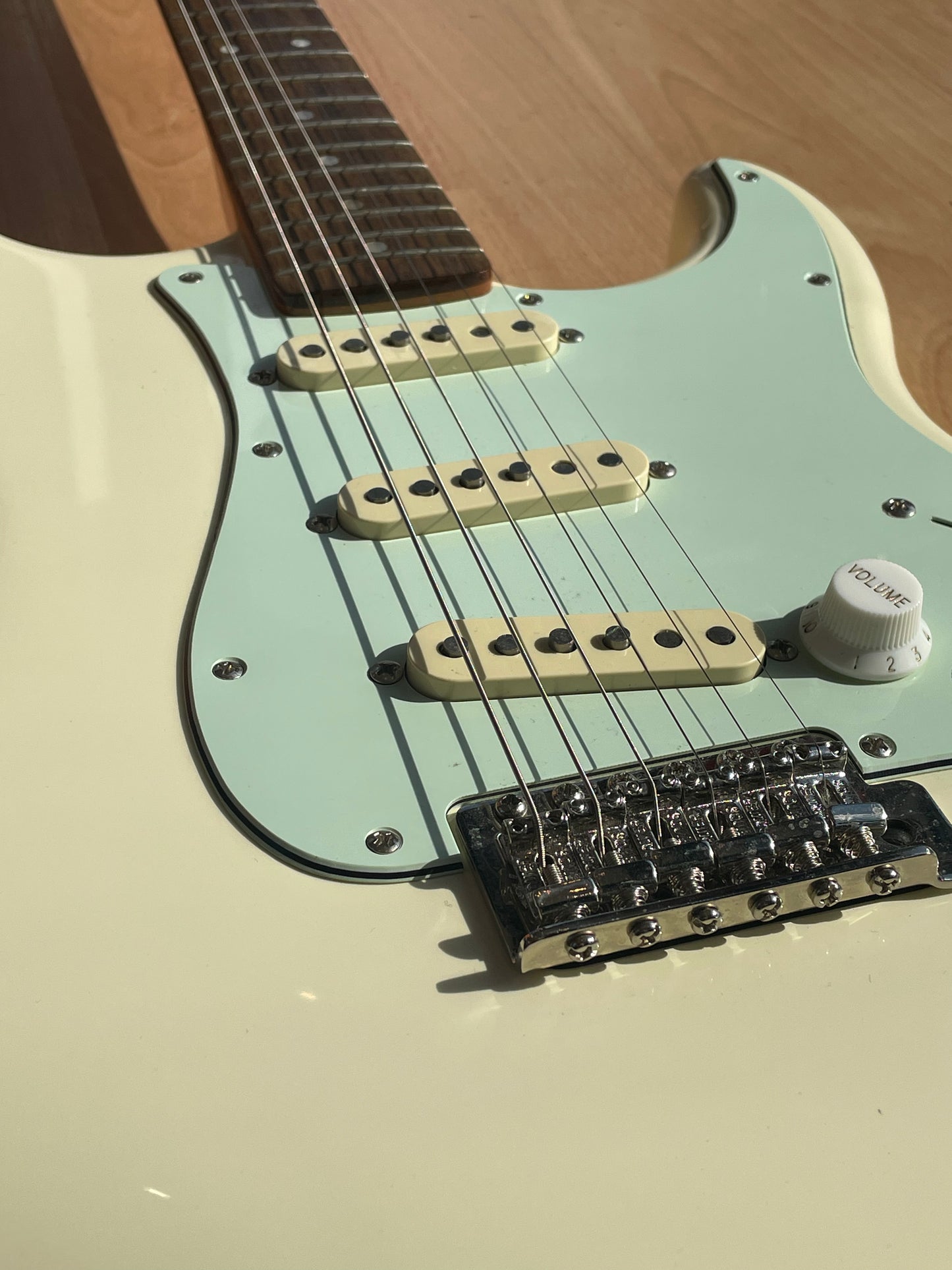 Squier Classic Vibe Strat with Beautiful Cream finish and Mint Green pickguard