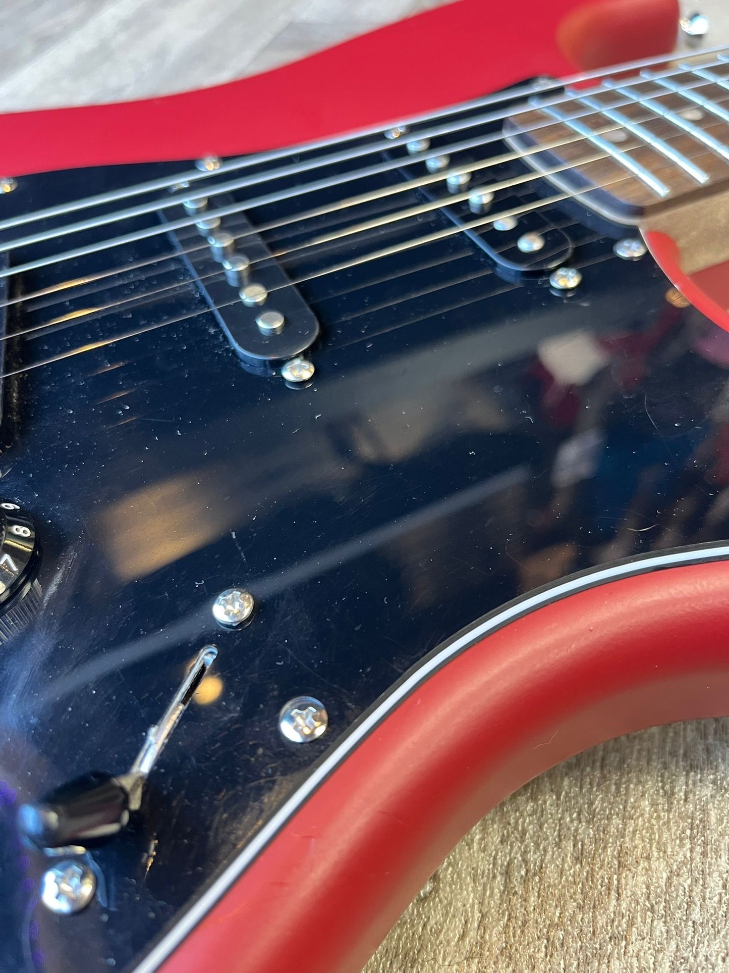 Modified Squier Stratocaster in Cherry Red with Black pickguard
