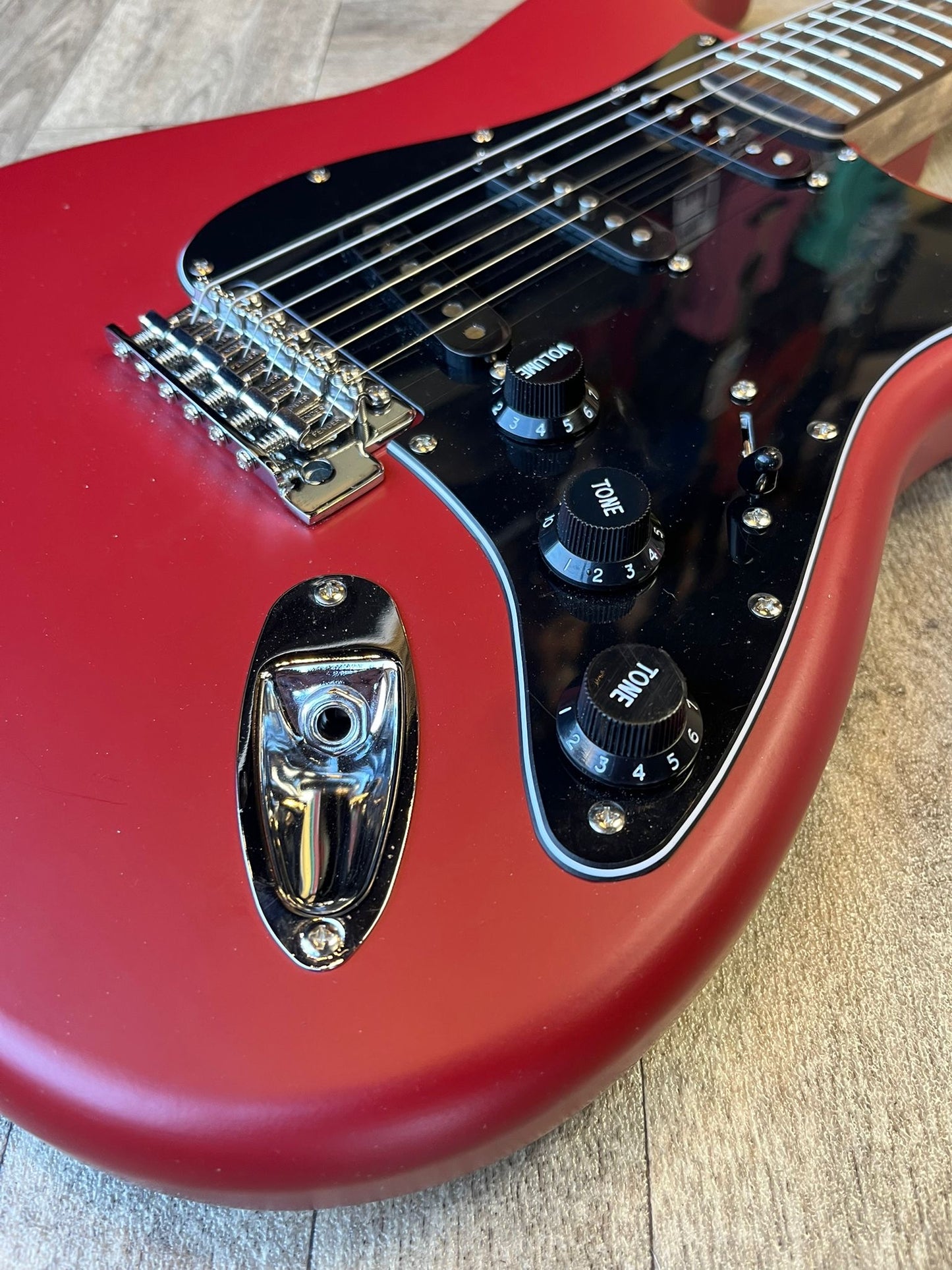 Modified Squier Stratocaster in Cherry Red with Black pickguard
