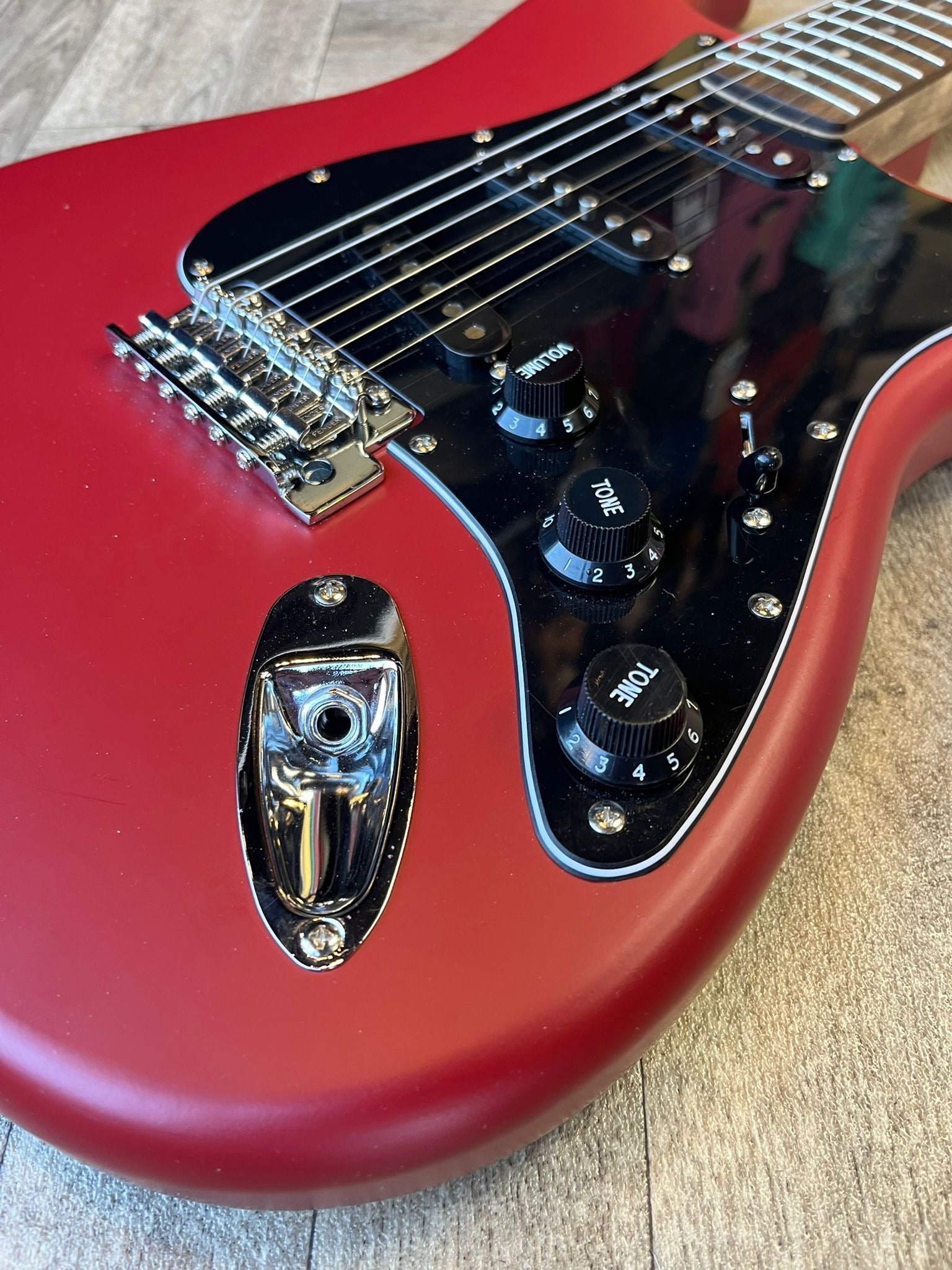 Modified Squier Stratocaster in Cherry Red with Black pickguard