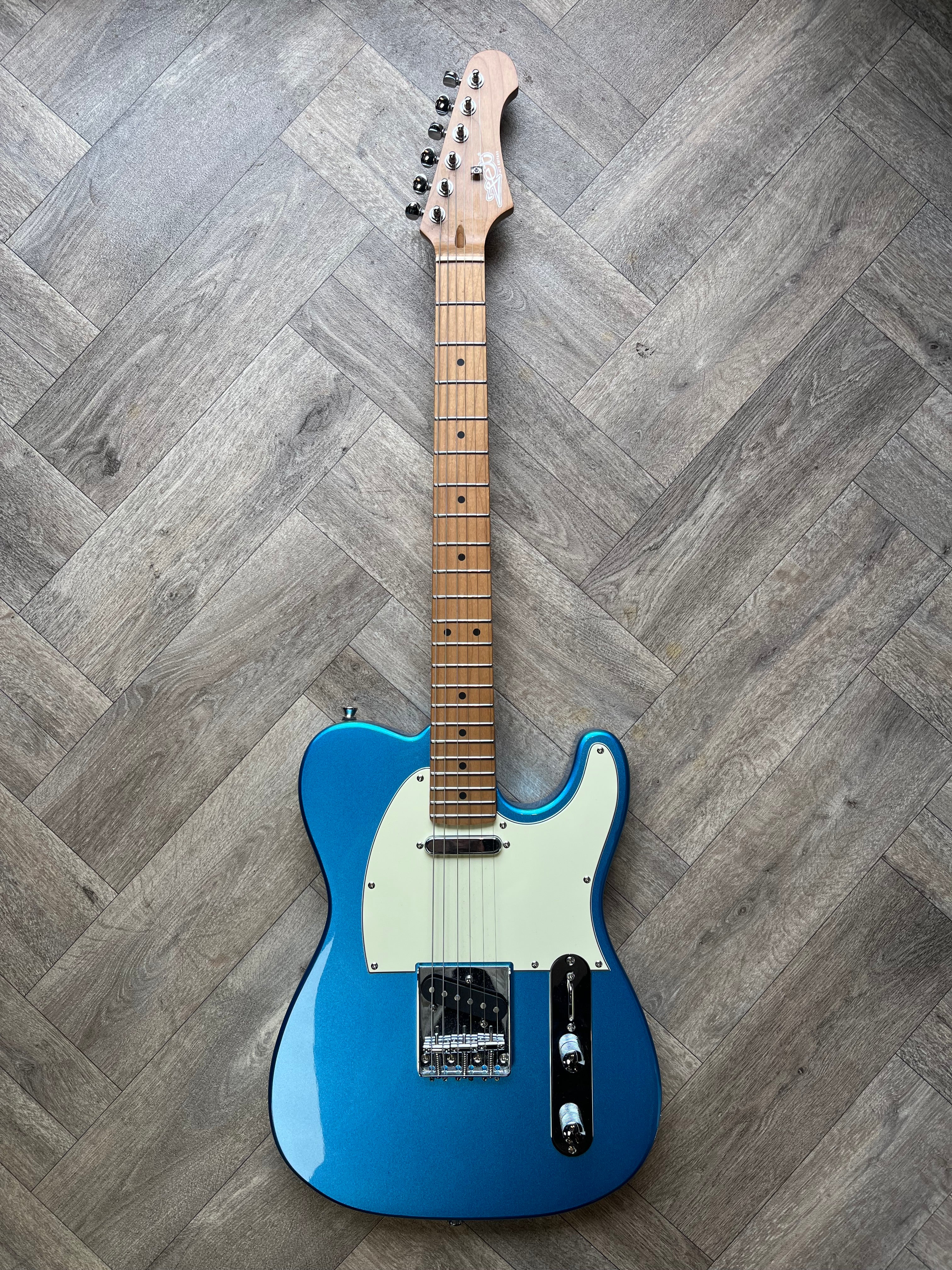 Stunning Jet Telecaster Style Guitar in Sky Blue Frost