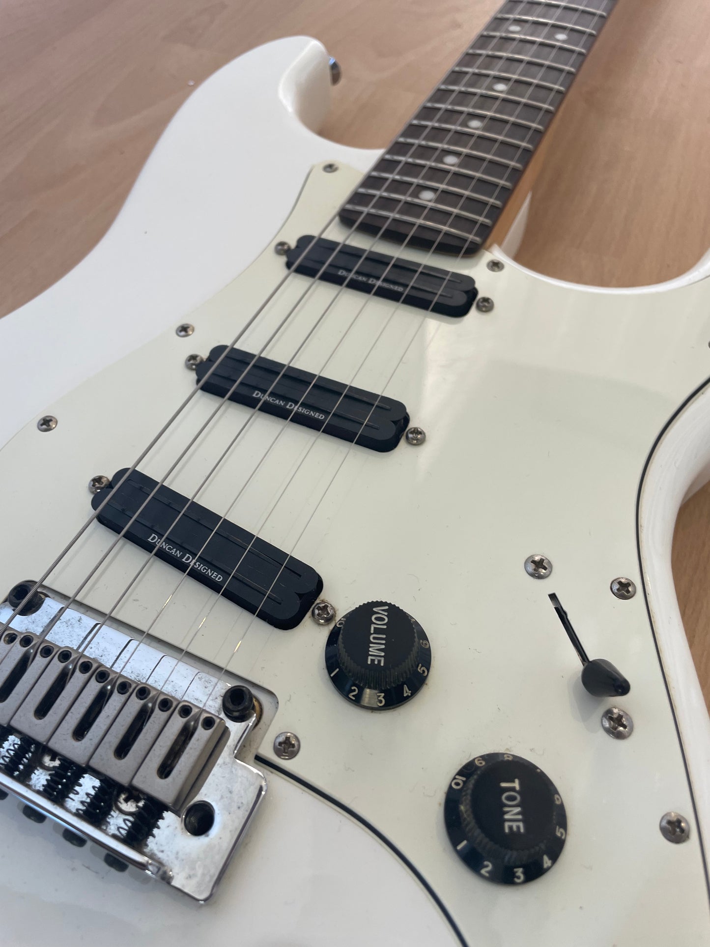 Beautful White Squier Strat modified with Seymour Duncan Pickups
