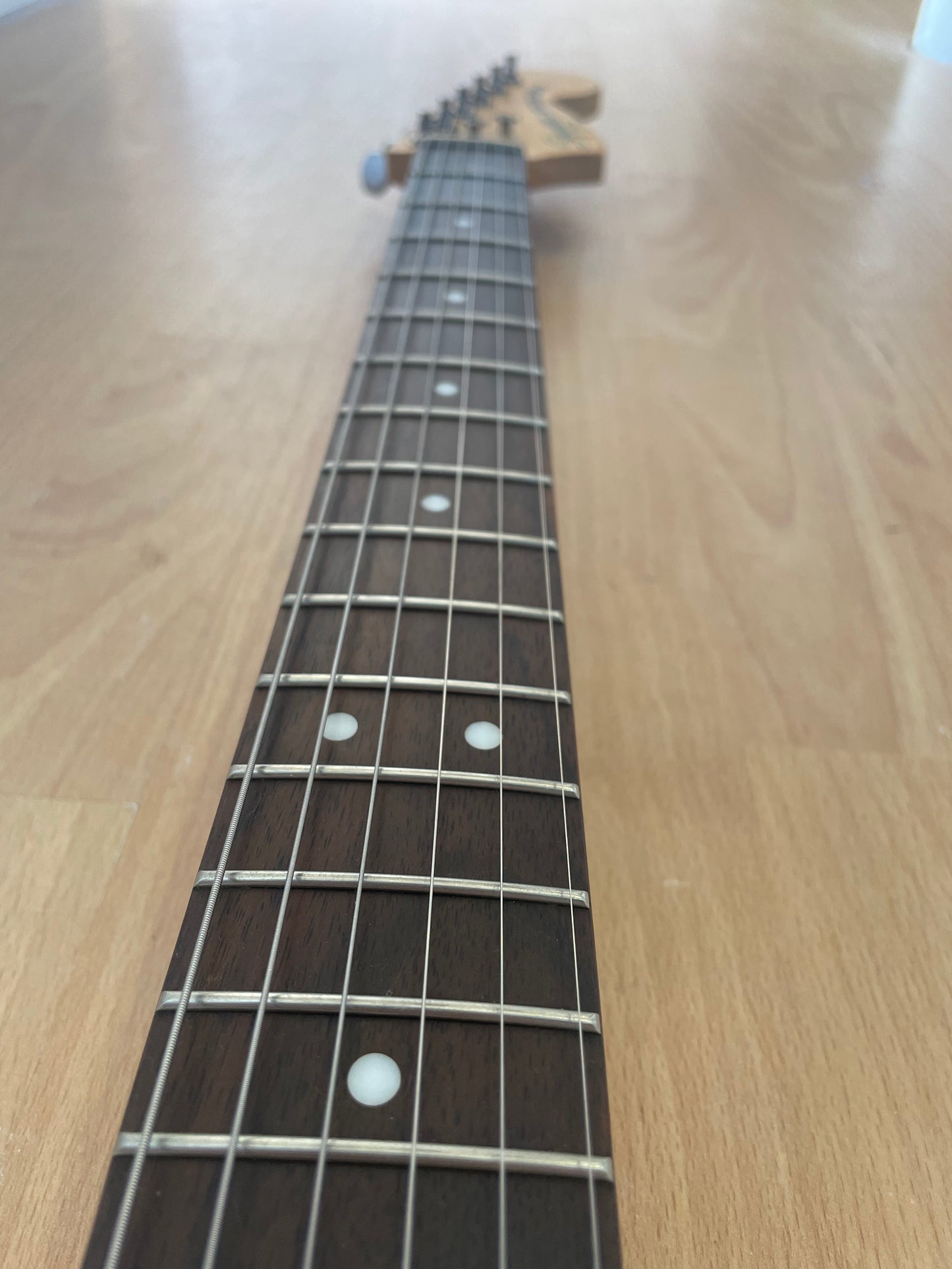 Beautful White Squier Strat modified with Seymour Duncan Pickups
