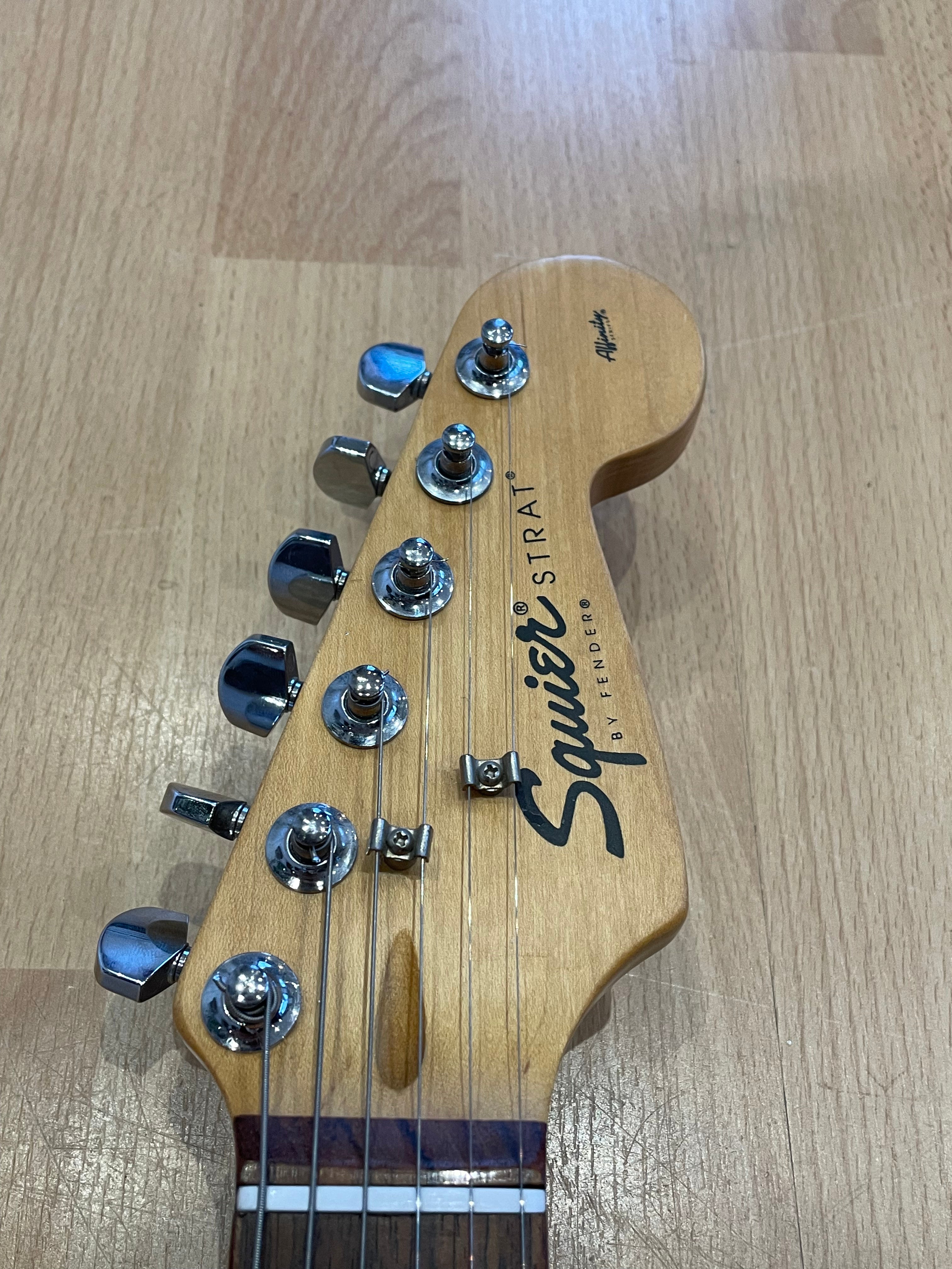 Squier Strat in Bright Red- good condition