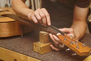 Guitar Setup - Acoustic or Electric - Improves Playability