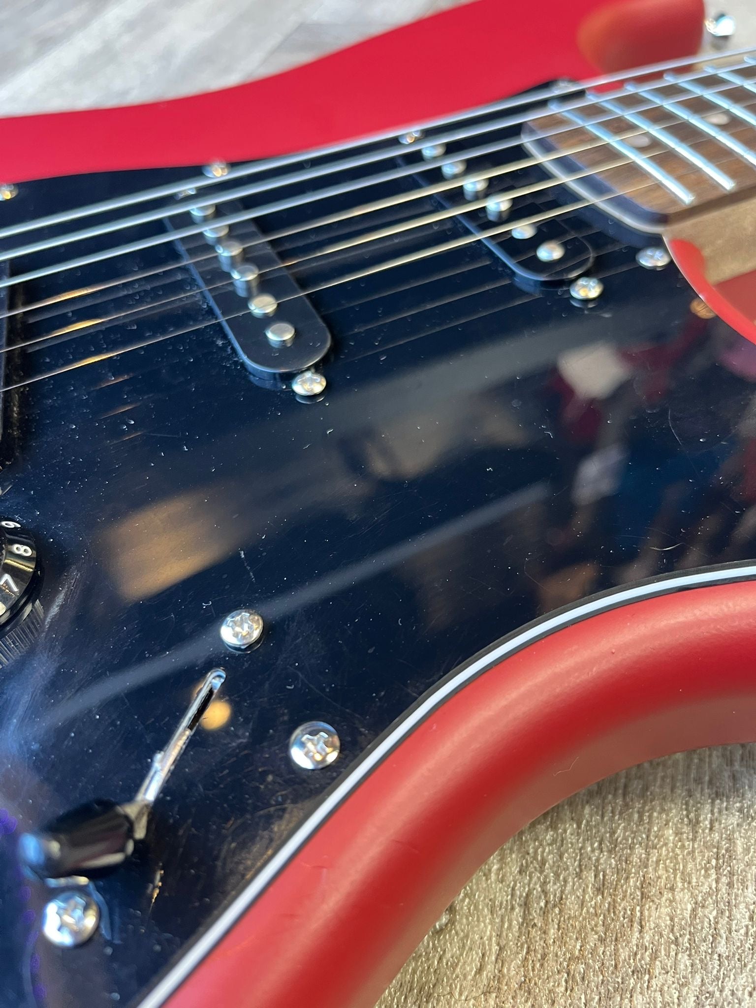 Modified Squier Stratocaster in Cherry Red with Black pickguard